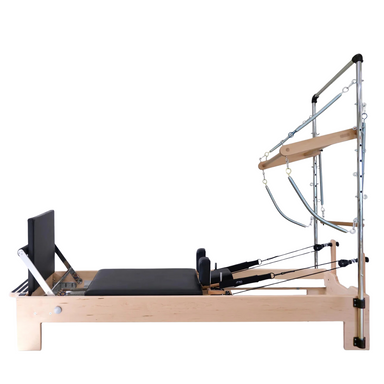 Atro Pilates Tower Reformer maple wood frame with adjustable pulleys and black cushioned platform