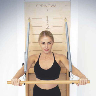 Atro Pilates Springwall wall-mounted Pilates equipment with adjustable springs and wooden push-through bar