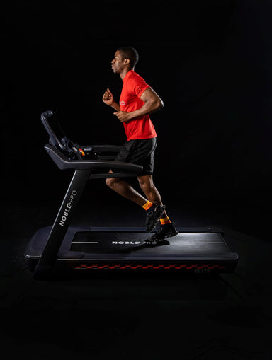 black NoblePro treadmill with 15.6 inch HD touchscreen and large running area