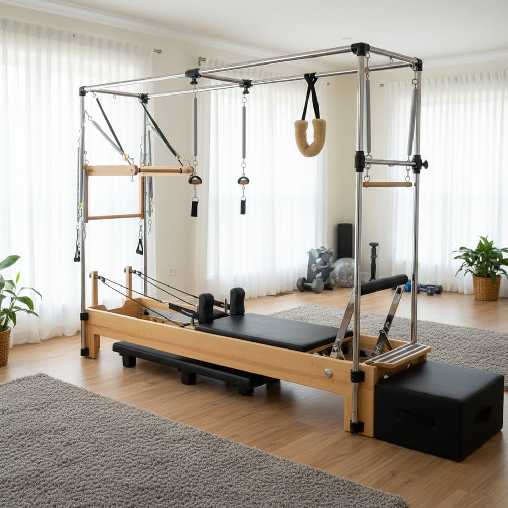 Atro Pilates Cadillac reformer machine with maple wood frame and anti-bacterial upholstery in home gym setting