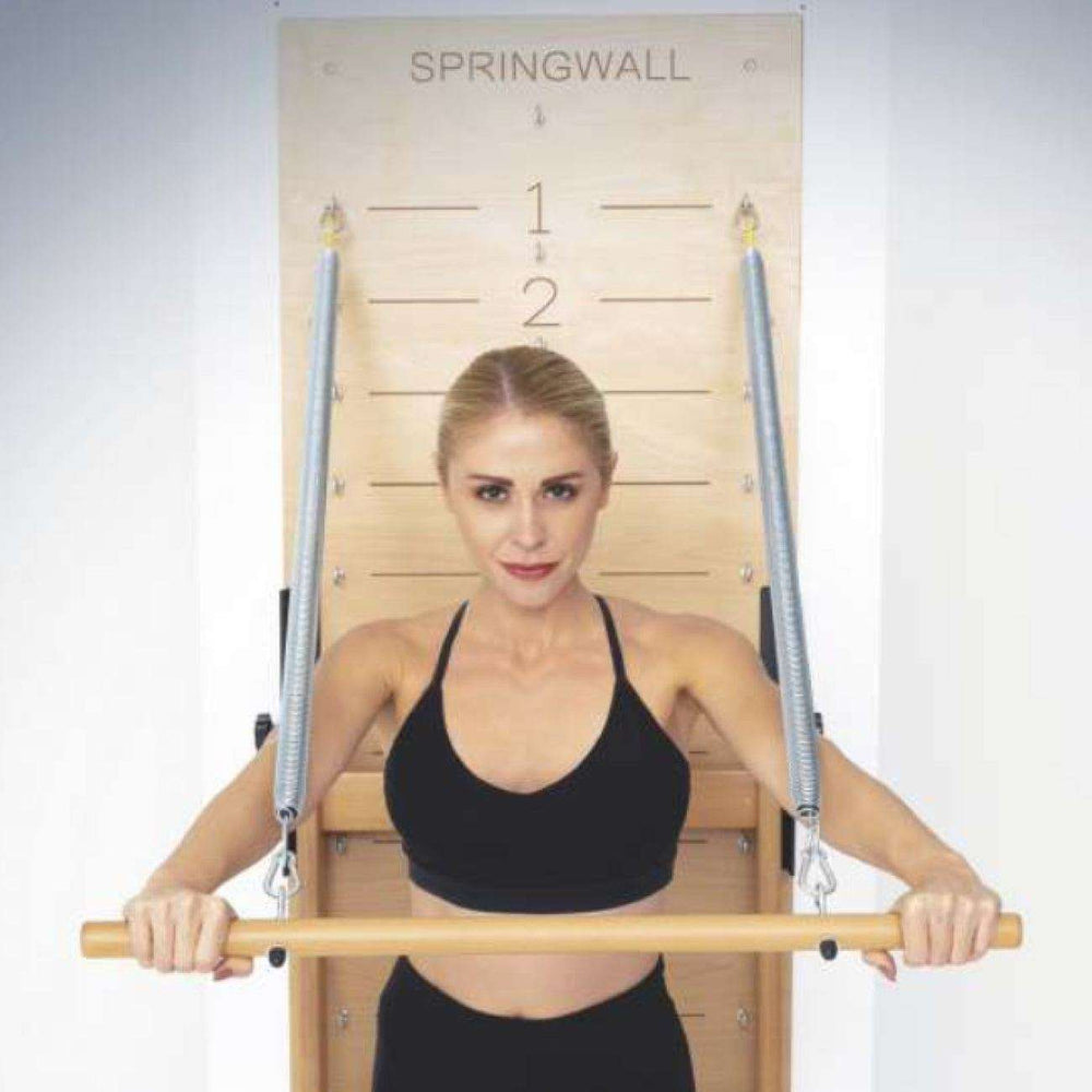 Atro Pilates Springwall wall-mounted Pilates equipment with adjustable springs and wooden push-through bar