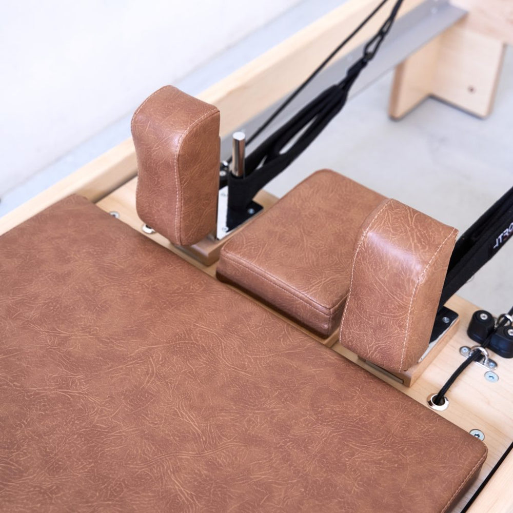 wooden pilates machine for home gyms, eco-friendly workout equipment, sustainable gym reformer