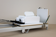 white reformer machine for studio, white leather workout equipment