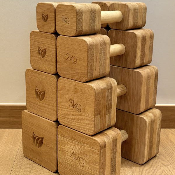 HomeHealth Eco solid oak dumbbells set with 1kg, 2kg, 3kg, and 4kg weights, wooden handles, and eco-friendly design