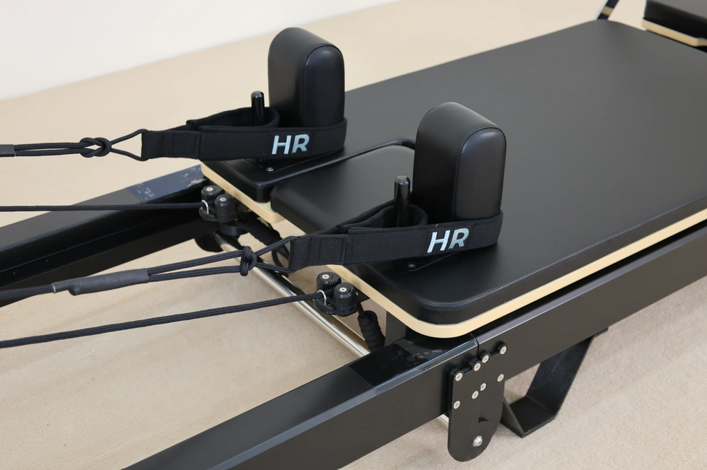 Folding pilates equipment for studios, black leather , aluminium machine