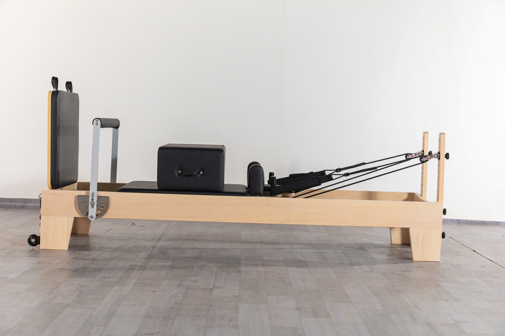 maple wood pilates machine and reformer for home, studio, yoga