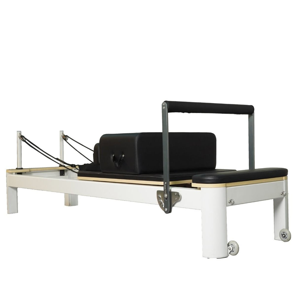 white wood pilates reformer with blak leather home use