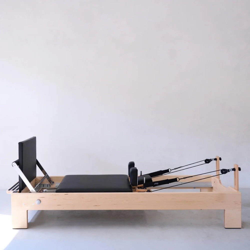 sustainable workout equipment for home and studio, wood pilates reformer