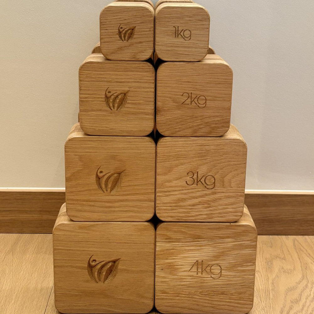 eco-friendly dumbbells set with engraved weights in 1kg, 2kg, 3kg, and 4kg, eco-friendly wooden fitness equipment