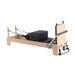 maple pilates reformer with black leather  for home and yoga studio