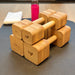 HomeHealth Eco Solid Oak Dumbbells set with natural oak weights and ash wood handles on yoga mat with water bottle and towel